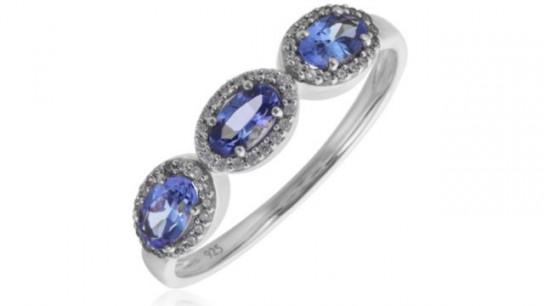 0.72ct Oval Tanzanite & 0.10ct Diamond East West Trilogy Ring 9ct Gold